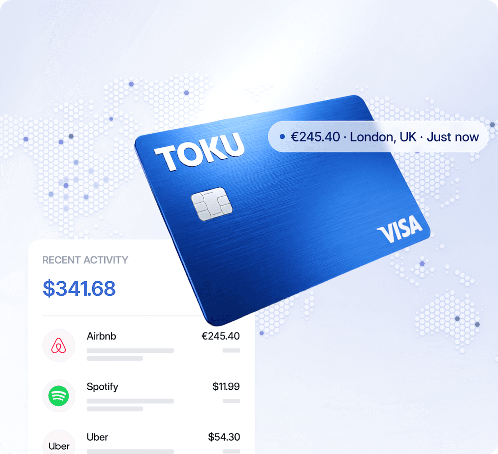 Toku Visa card with recent purchase activity over a world map.